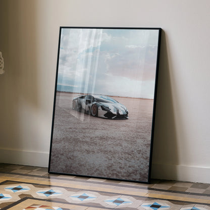 Lamborghini Huracan poster with sleek black sports car on desert landscape wall art.