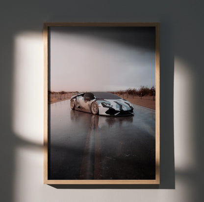 Lamborghini Huracan on wet road with dramatic sky poster wall art in wooden frame.