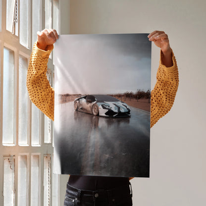 Lamborghini Huracan racing on wet road poster wall art with dramatic cloudy sky.