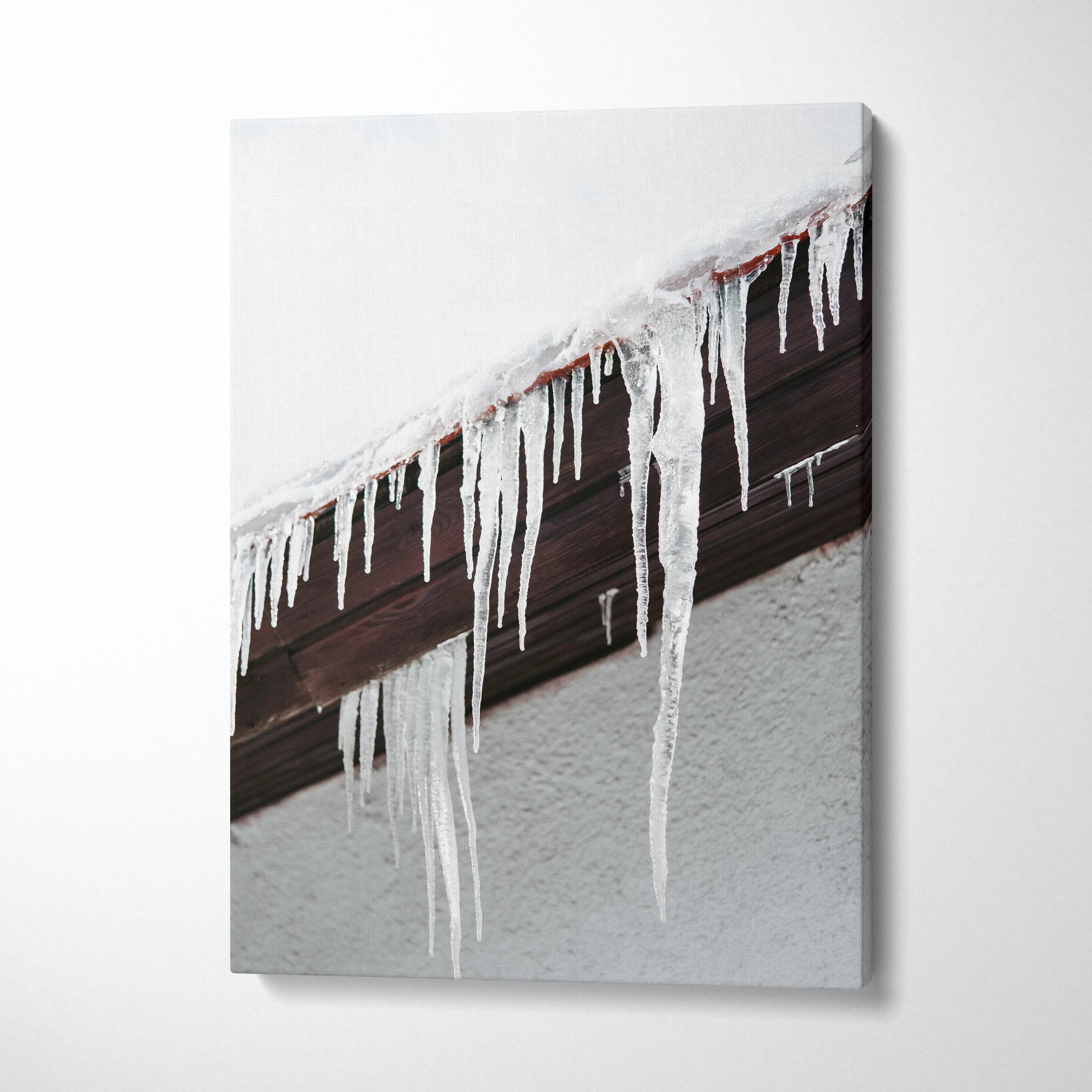 Canvas wall art featuring detailed roof icicles and snowy winter decor in vertical orientation.