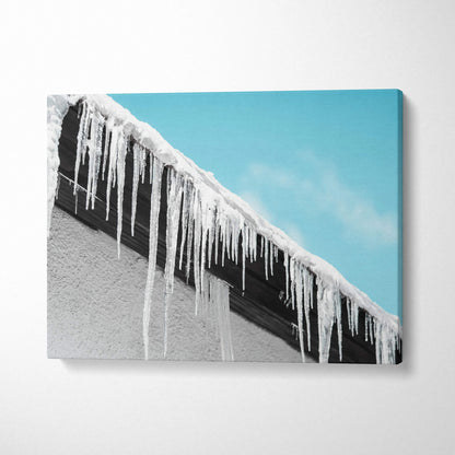 Canvas wall art featuring stunning winter roof icicles with bright blue sky and snowfall decor.