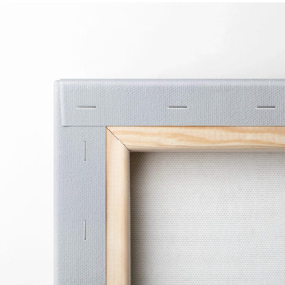 Close-up of wooden stretcher frame and textured canvas fabric for wall art decor.