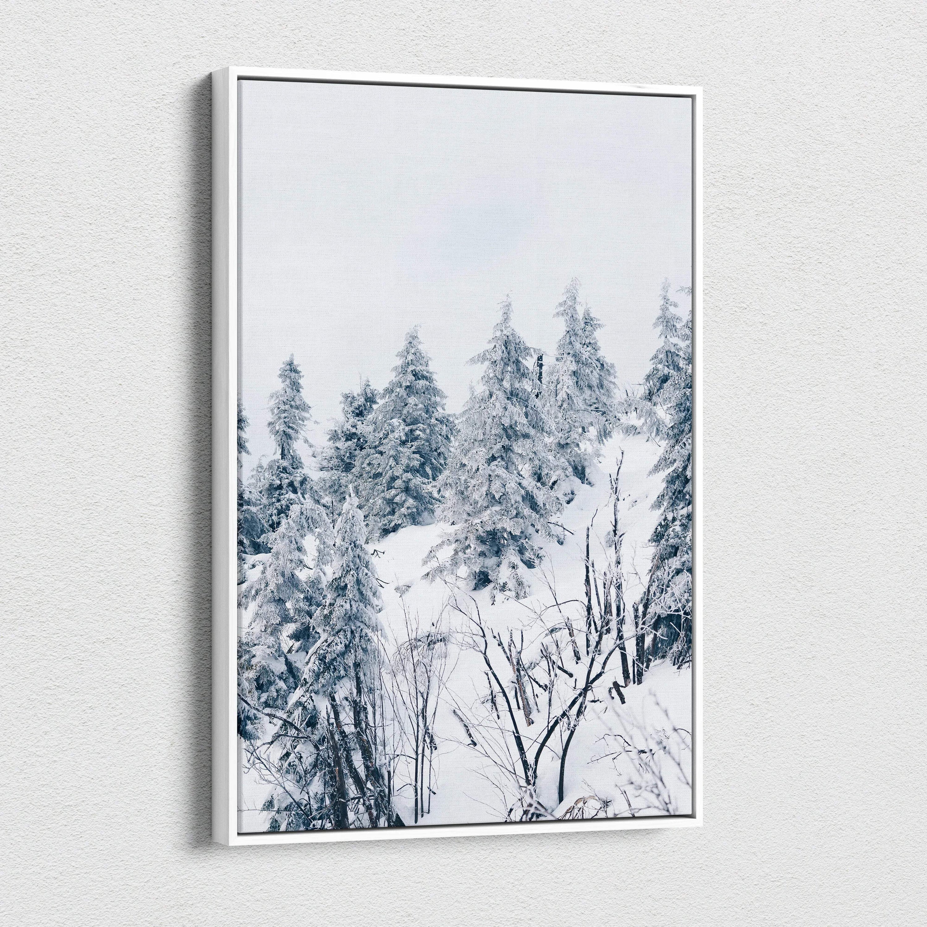 Winter landscape canvas wall art featuring snow-covered trees in a vertical format, elegant decor piece.
