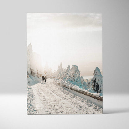 Canvas wall art depicting a snowy road with frosted trees under a pale, overcast sky.