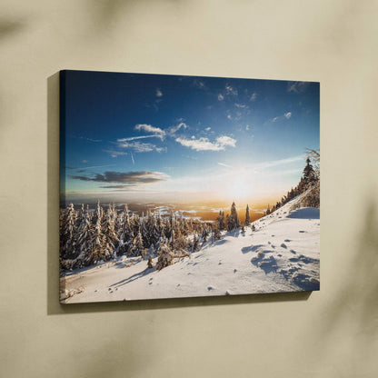 High-resolution canvas wall art featuring a snowy winter forest landscape with a vibrant blue sky and warm sunset tones.