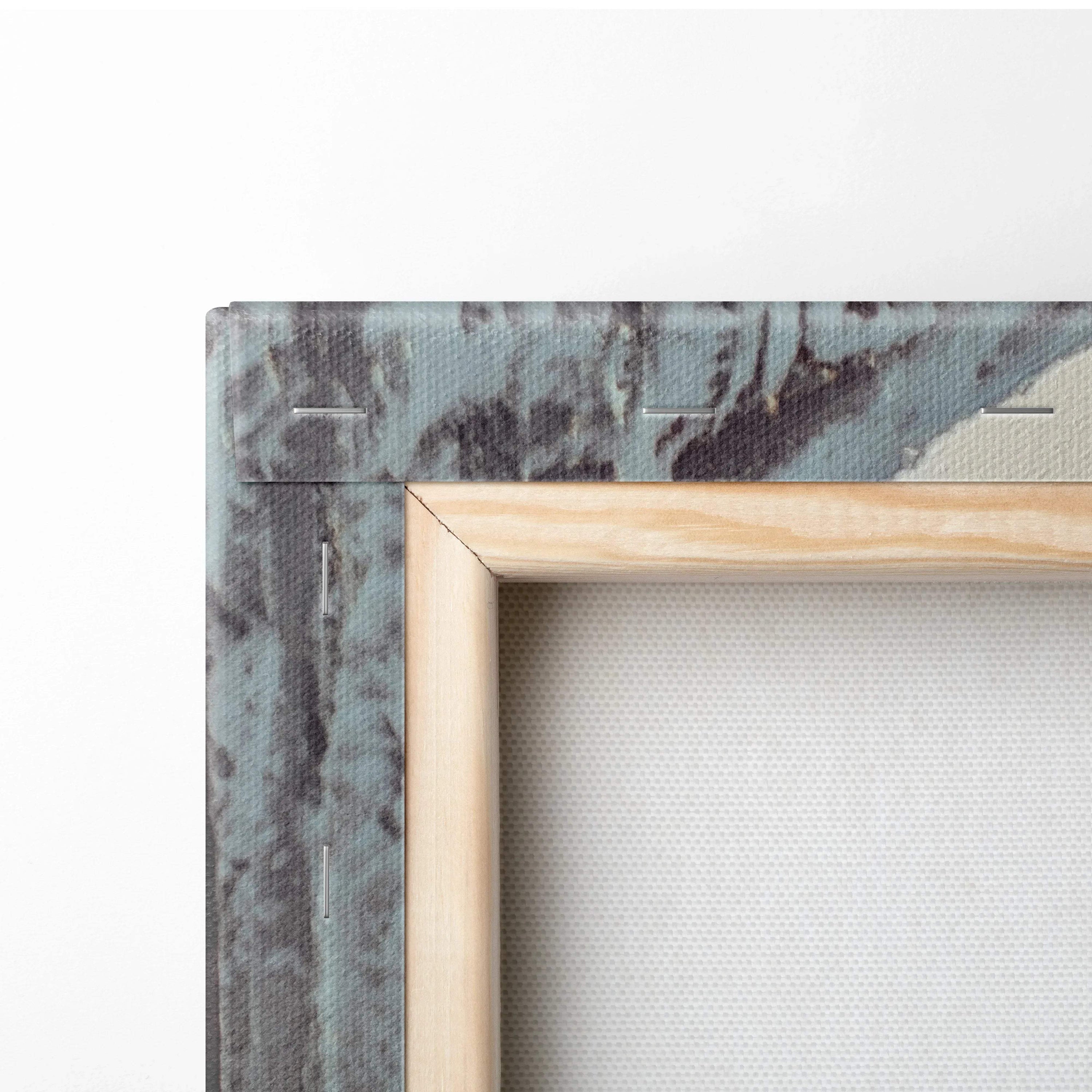 Close-up of canvas wall art corner with natural wooden frame and textured winter scene featuring blue-gray icicles and snow.