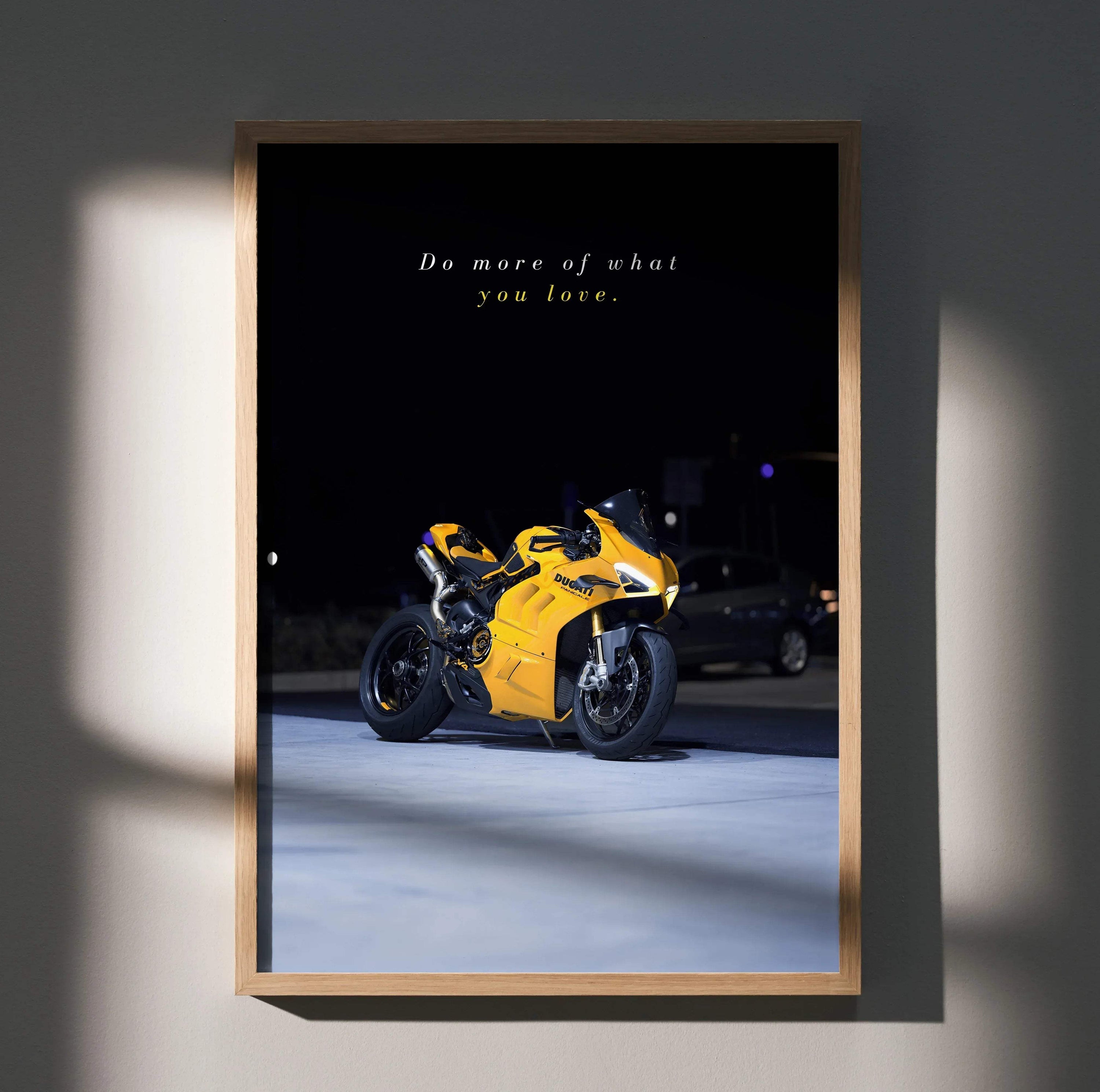 Ducati Panigale V4S poster wall art with yellow motorcycle and inspirational text on black background.