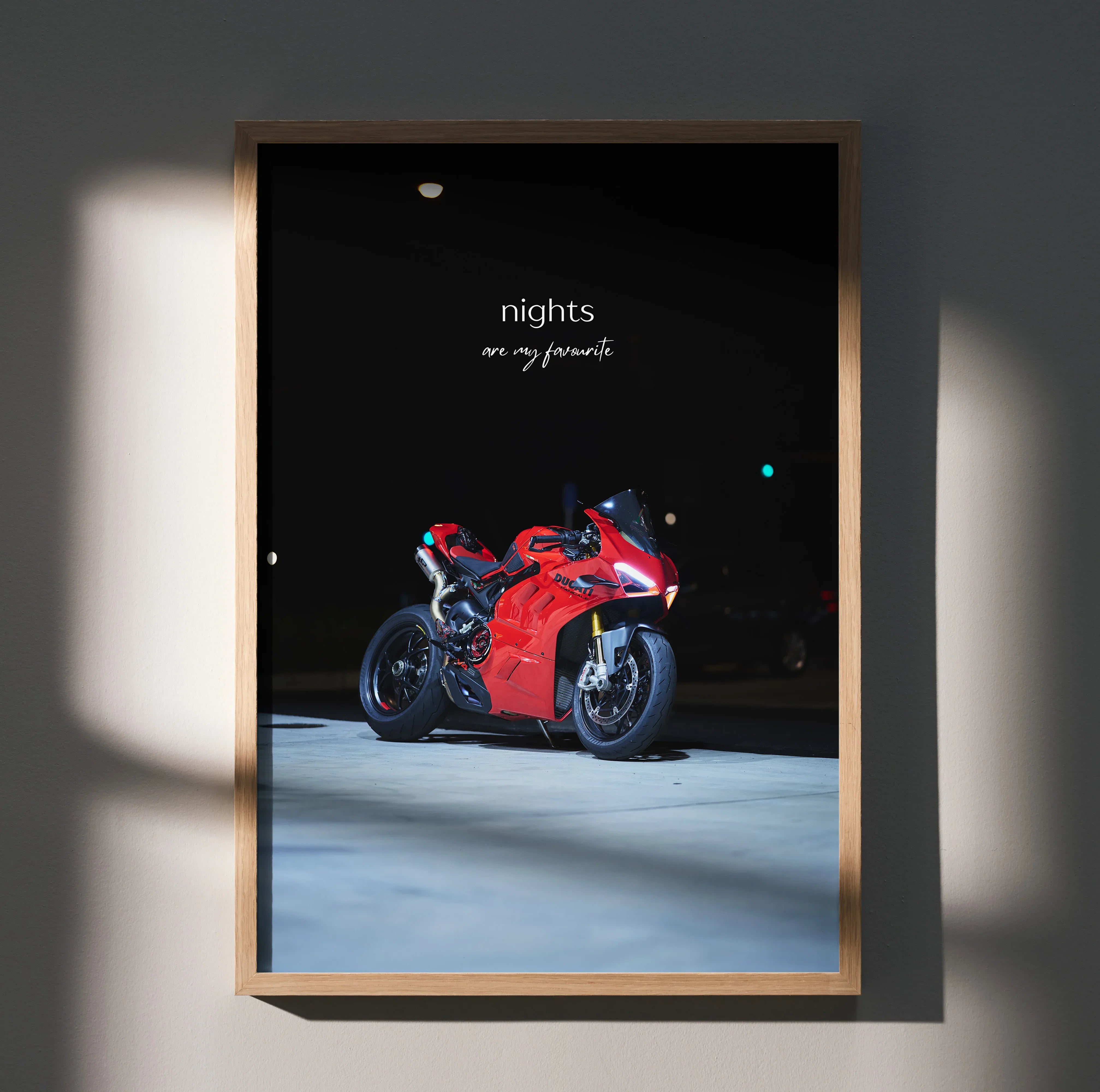 Motivational poster with red Ducati Panigale V4S motorcycle at night, black background wall art.