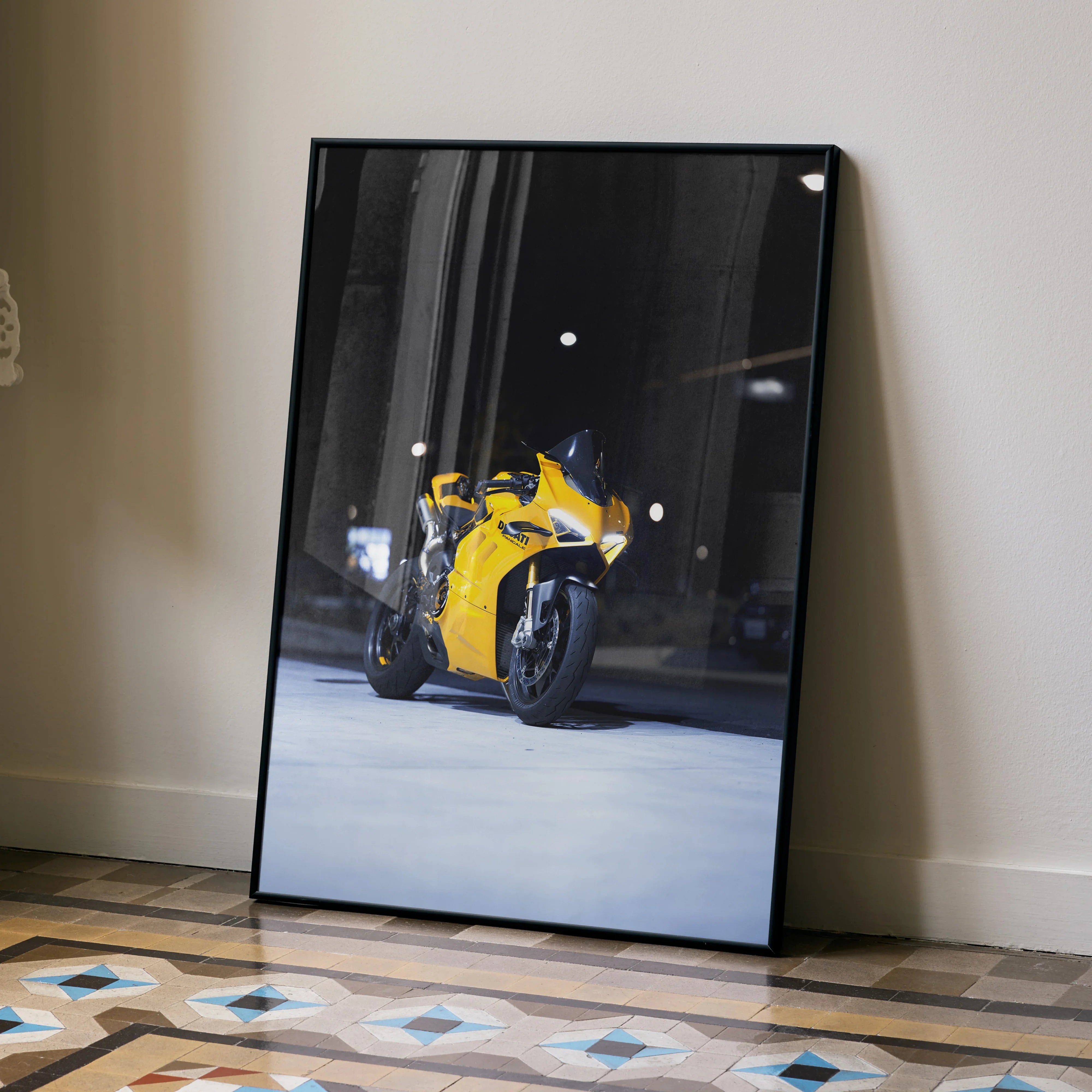 Framed poster wall art of yellow Ducati Panigale V4S motorcycle on dark urban background.