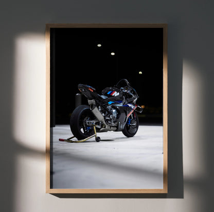 BMW M1000RR motorcycle poster with vibrant colors, sleek design, black background wall art.