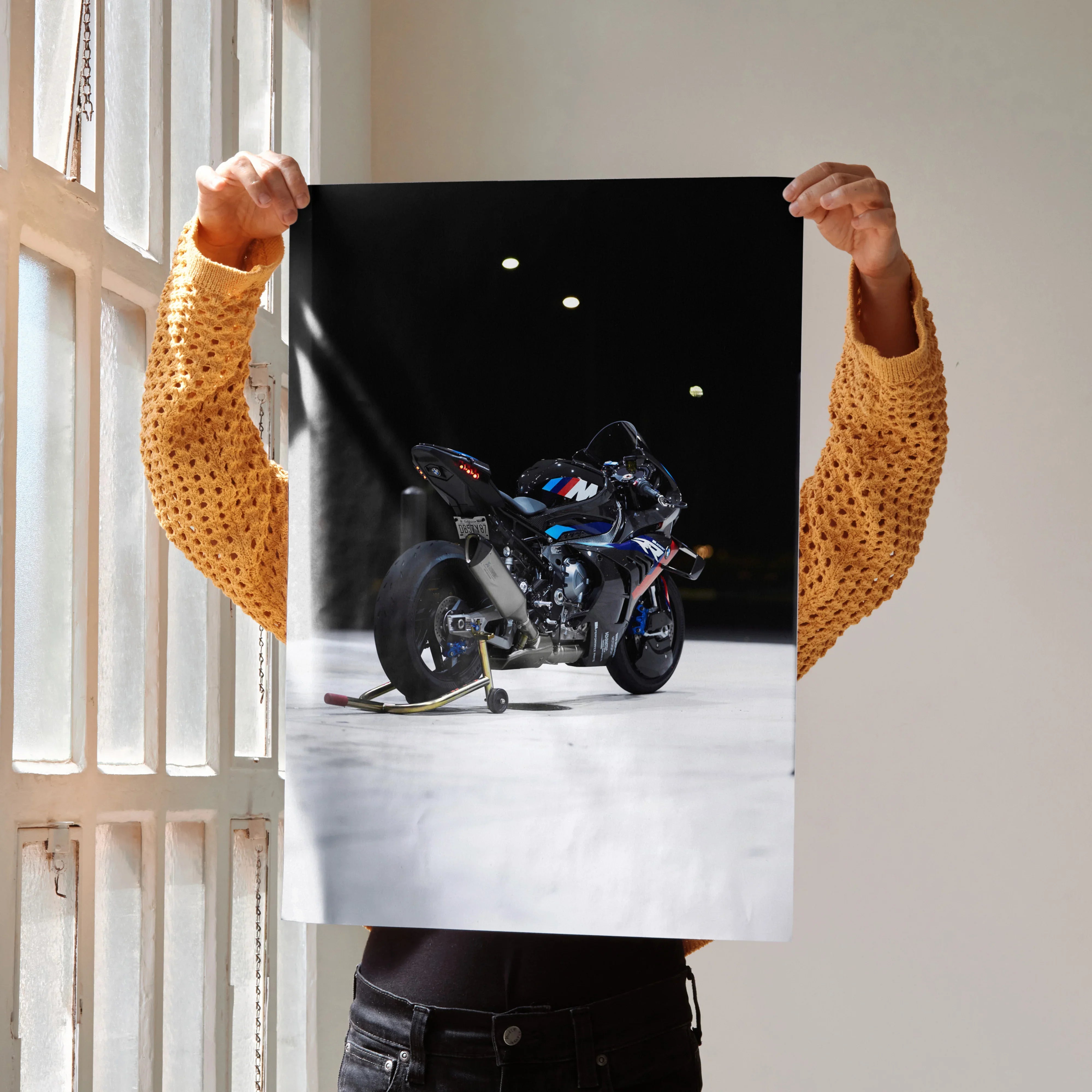 BMW M1000RR motorcycle poster showcasing vibrant, detailed wall art with a sleek black background.