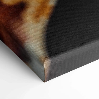 Close-up of canvas wall art corner showing textured fabric with brown, cream, and black abstract floral design.