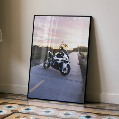 BMW S1000RR motorcycle poster with sunset background in sleek black frame wall art.