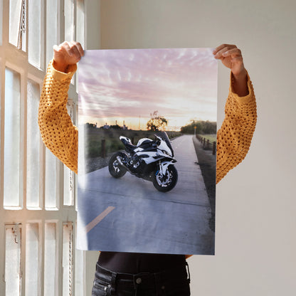BMW S1000RR motorcycle poster with sunset background, stylish wall art for modern spaces.