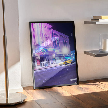 Toyota MR2 poster with vibrant neon-lit street scene, sleek yellow car, automotive wall art.