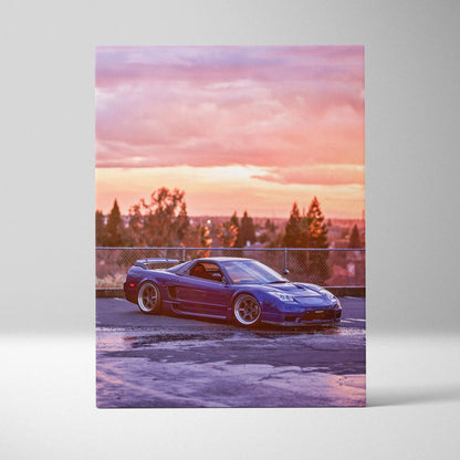 Vertical canvas wall art of a blue Acura NSX parked at sunset with a colorful sky background.