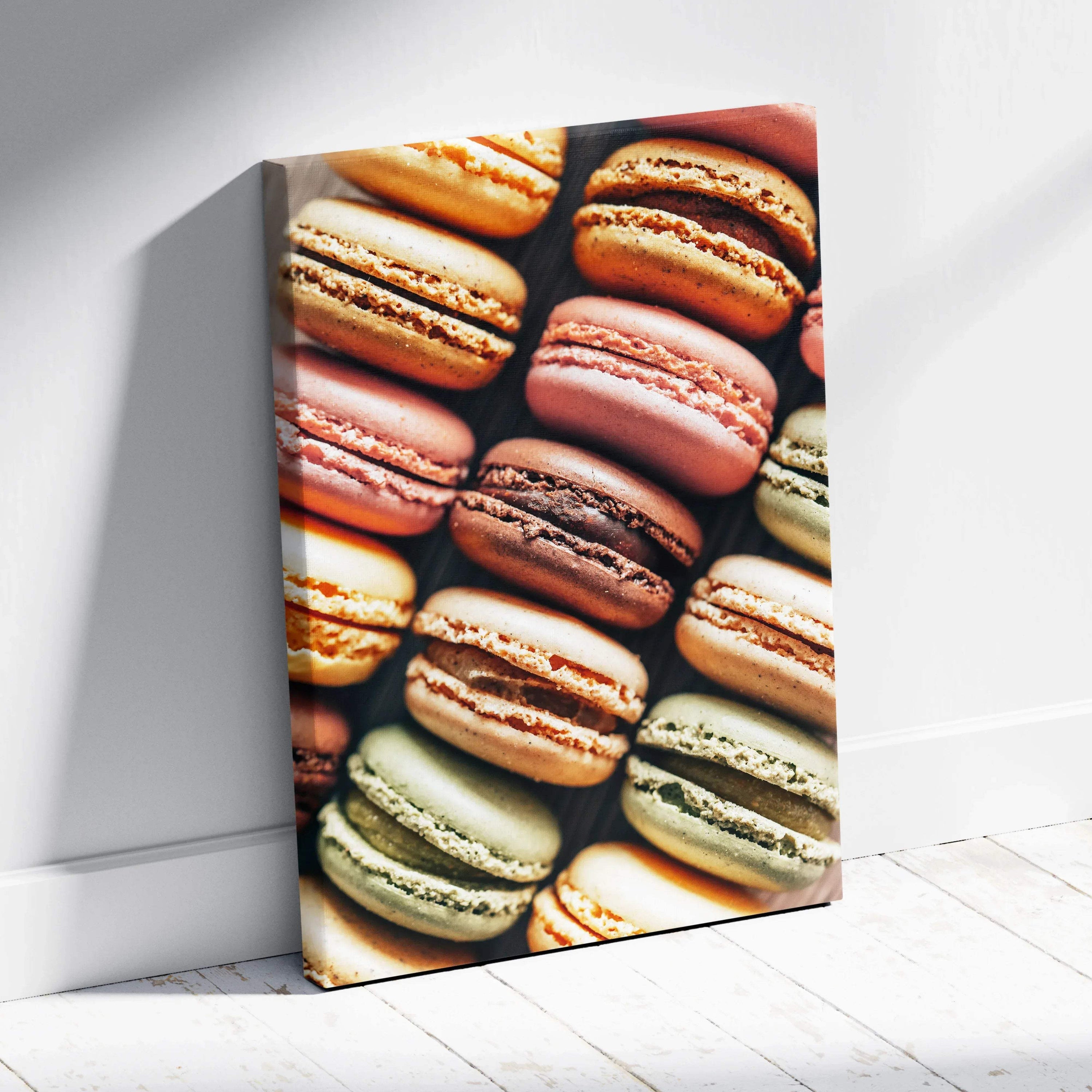 Canvas wall art featuring close-up of colorful macarons in pastel shades for decor.