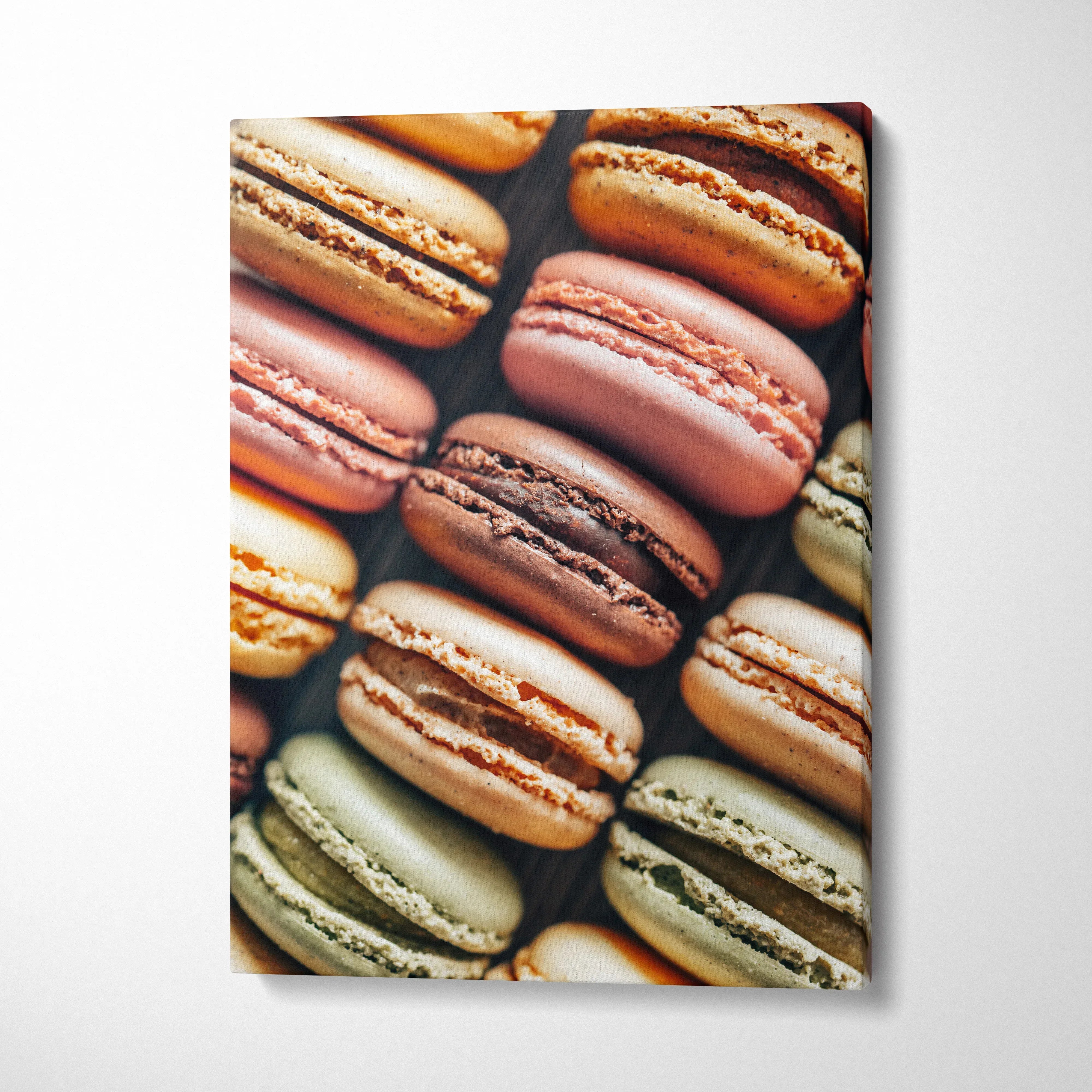 Canvas wall art featuring close-up of colorful macarons for stylish home decor.