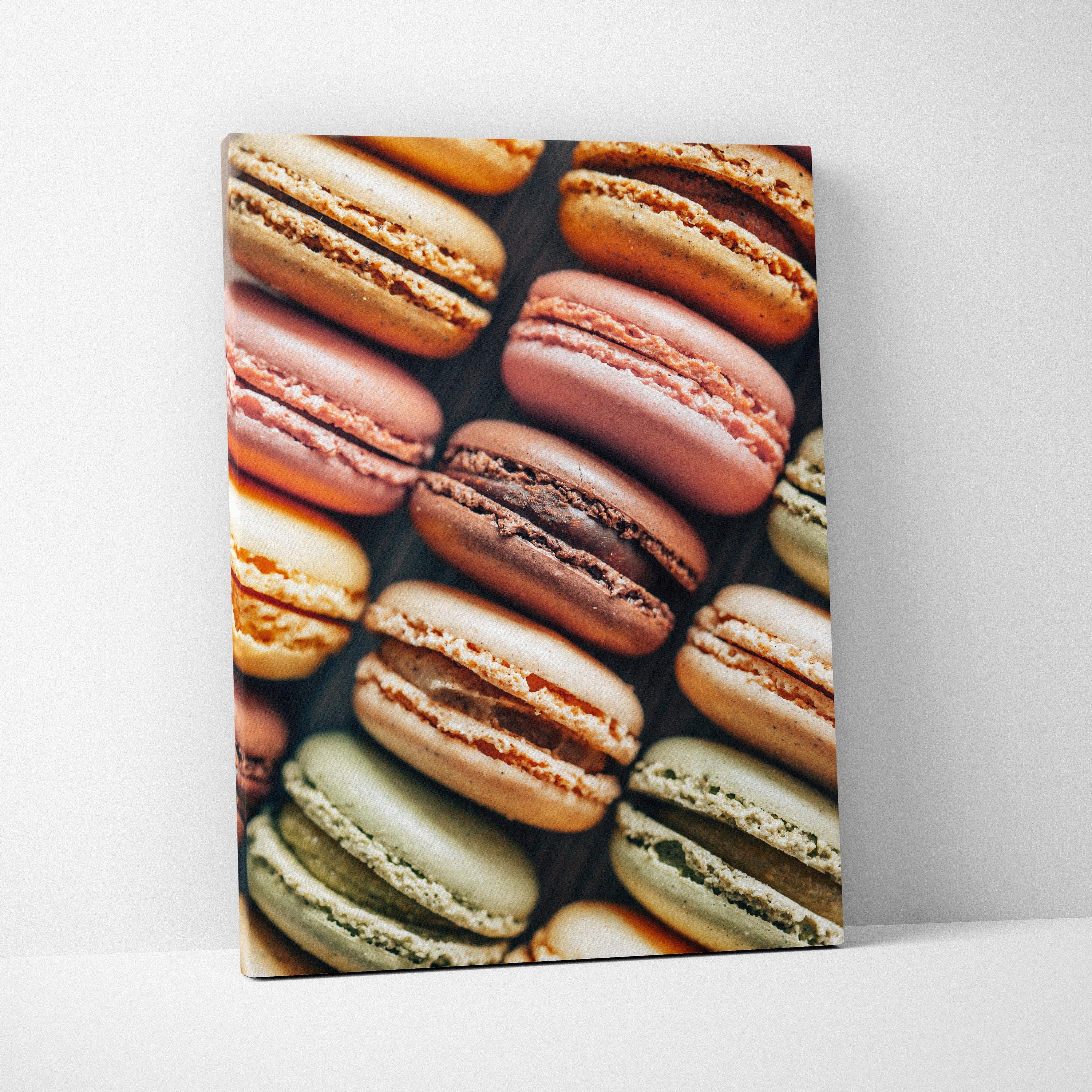 Canvas wall art featuring close-up of colorful macarons in pastel shades, perfect for food decor.
