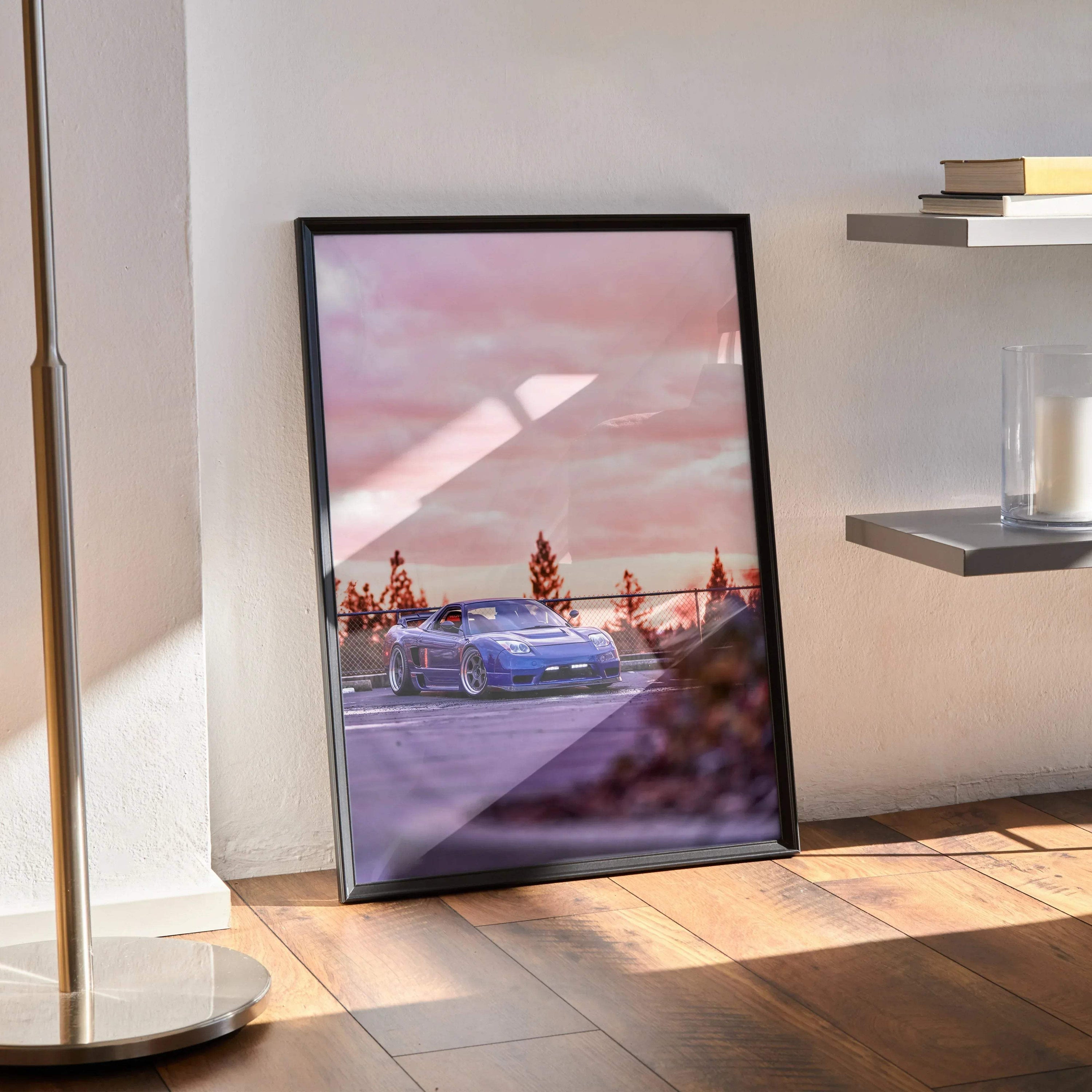 Acura NSX poster in black frame showing blue sports car on racetrack at sunset, wall art for car enthusiasts.