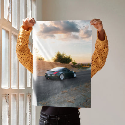 Nissan 350z car poster showing black sports car on road at sunset wall art.