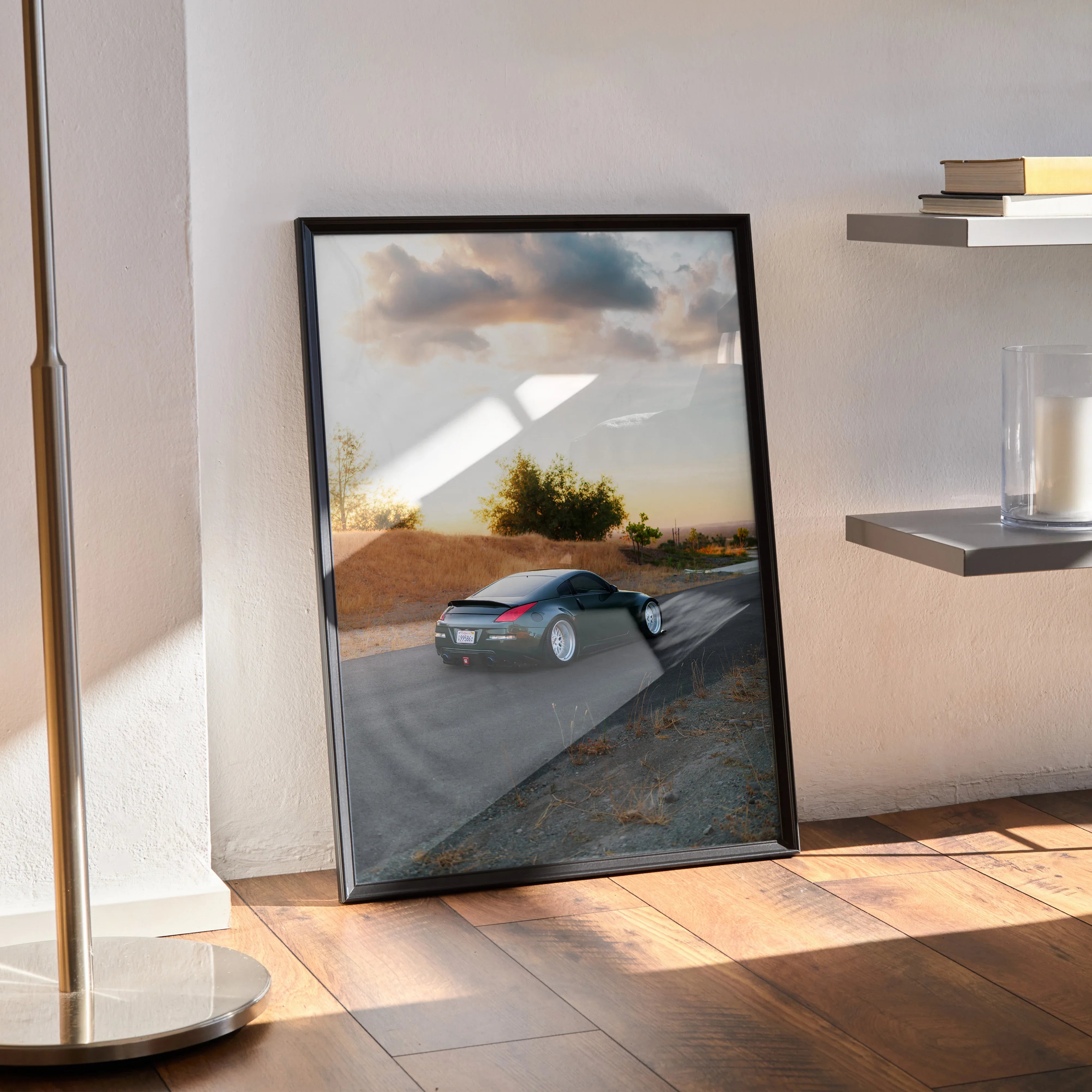 Nissan 350z car poster with scenic sunset background leaning against wall as modern wall art.