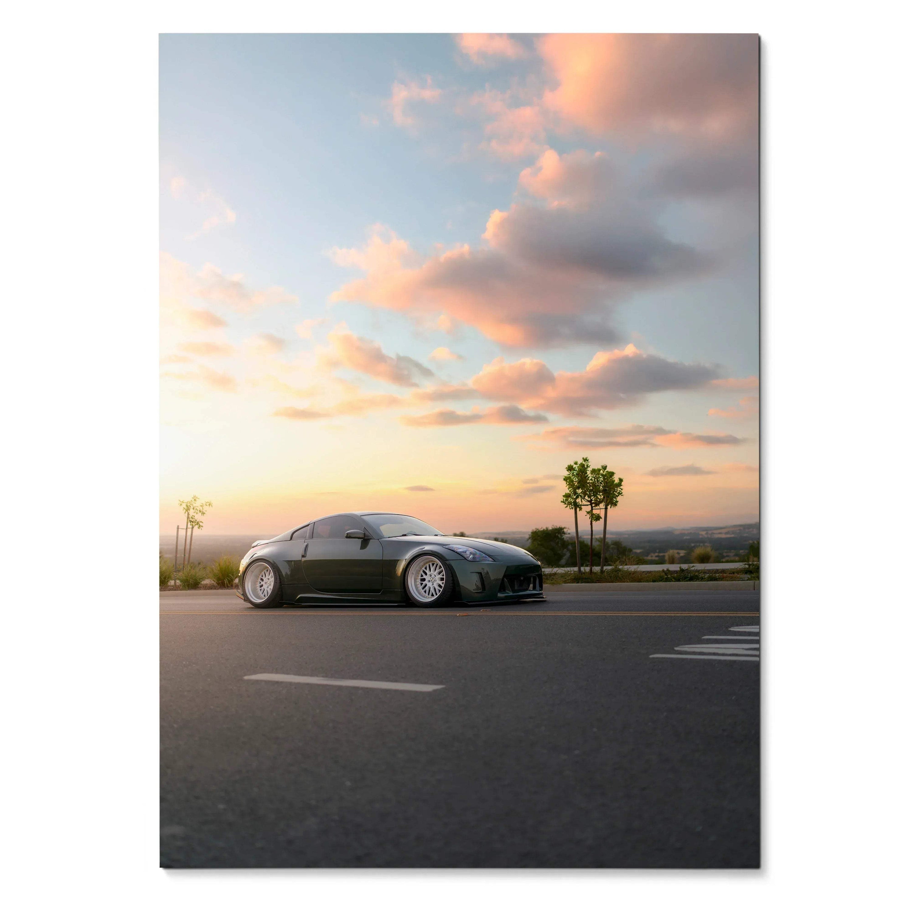 Nissan 350z on road at sunset with pink clouds poster wall art.