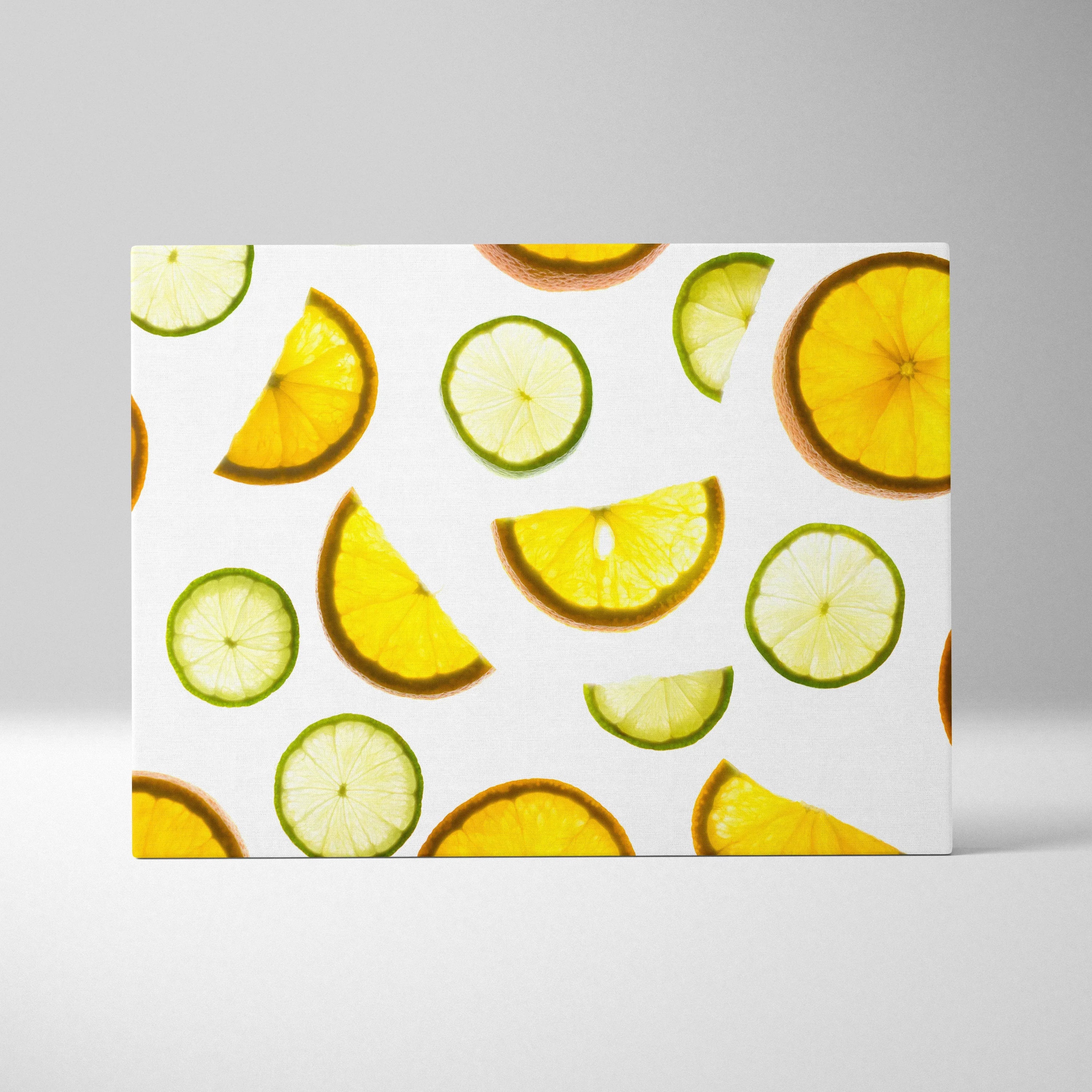 Canvas wall art featuring vibrant yellow lemons and green limes slices on a white background, bright and fresh kitchen decor.