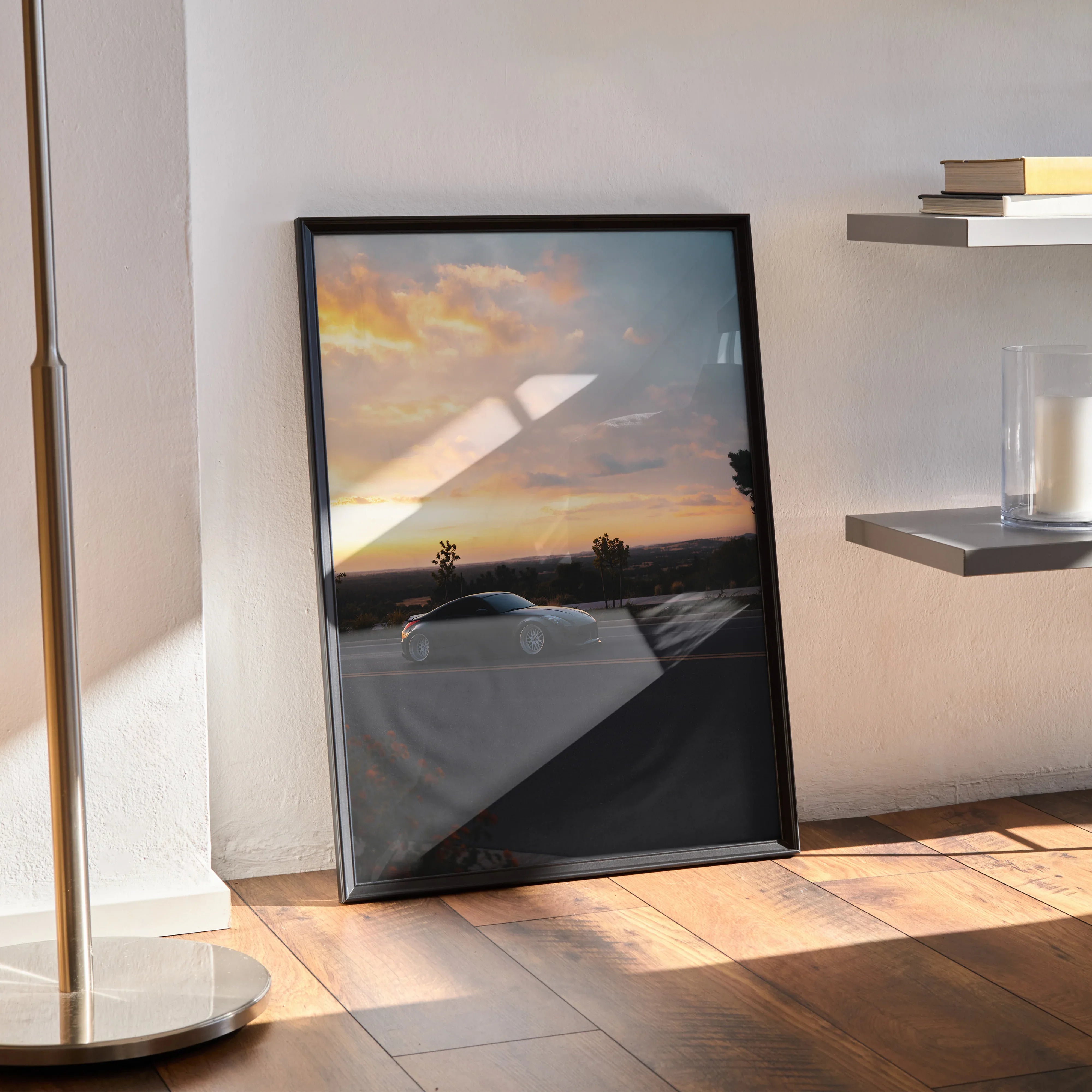 Nissan 350Z car parked at sunset with vibrant sky Poster wall art in black frame.