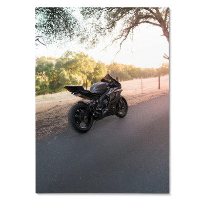 Black Yamaha R6 motorcycle parked on road at sunset poster wall art.