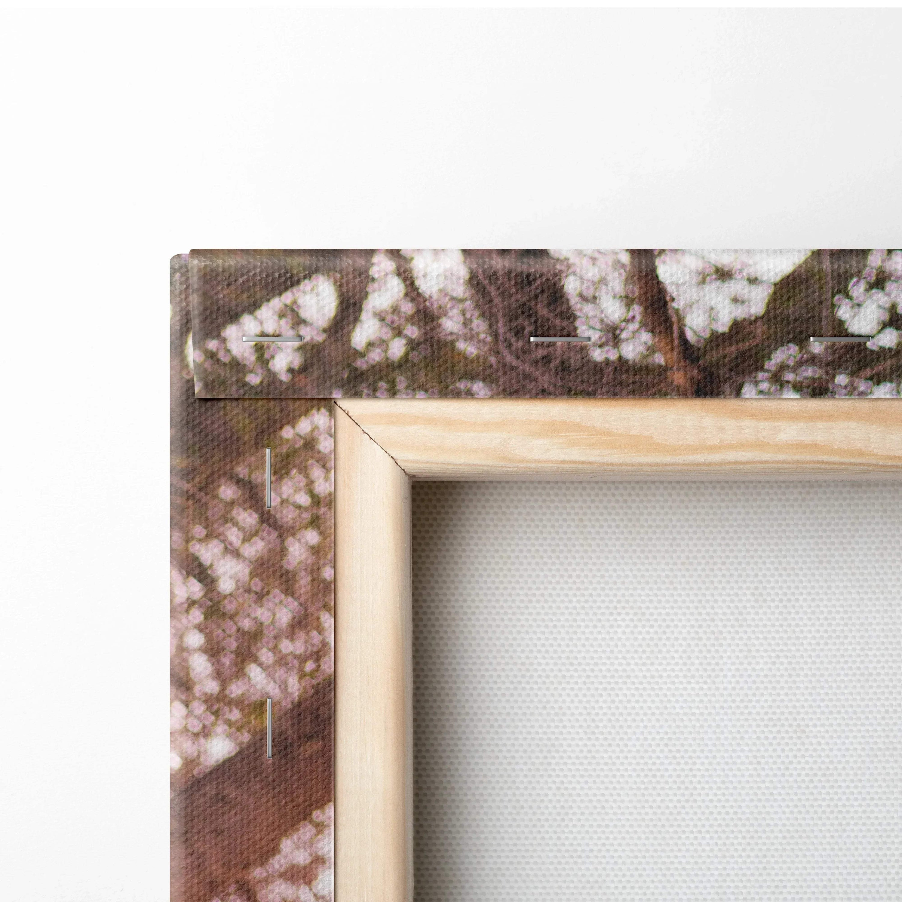 Close-up of wooden framed canvas art showing detailed corner stitching on Yamaha R6 motorcycle wall art.