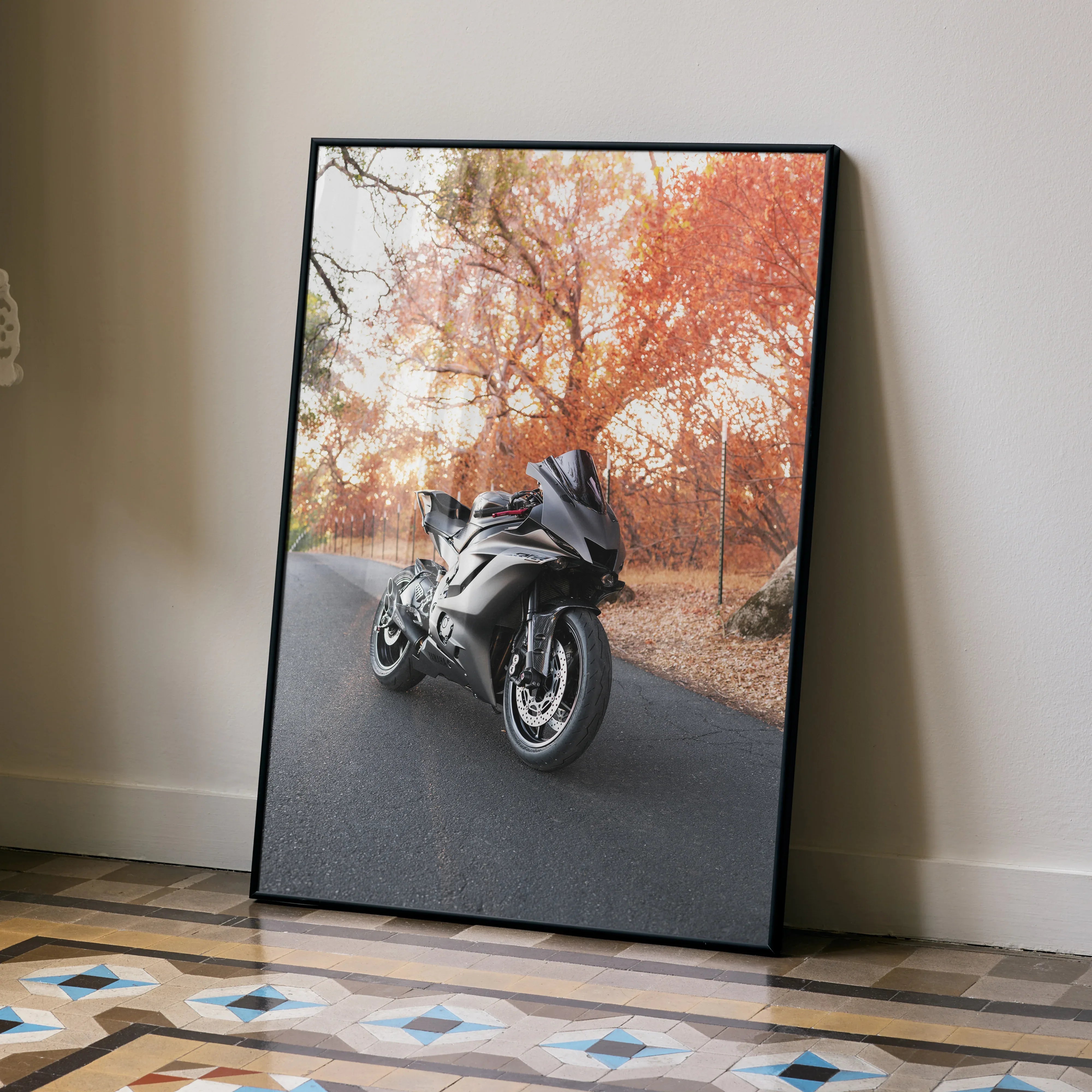 Yamaha R6 motorcycle on autumn road poster wall art with orange trees and black frame.