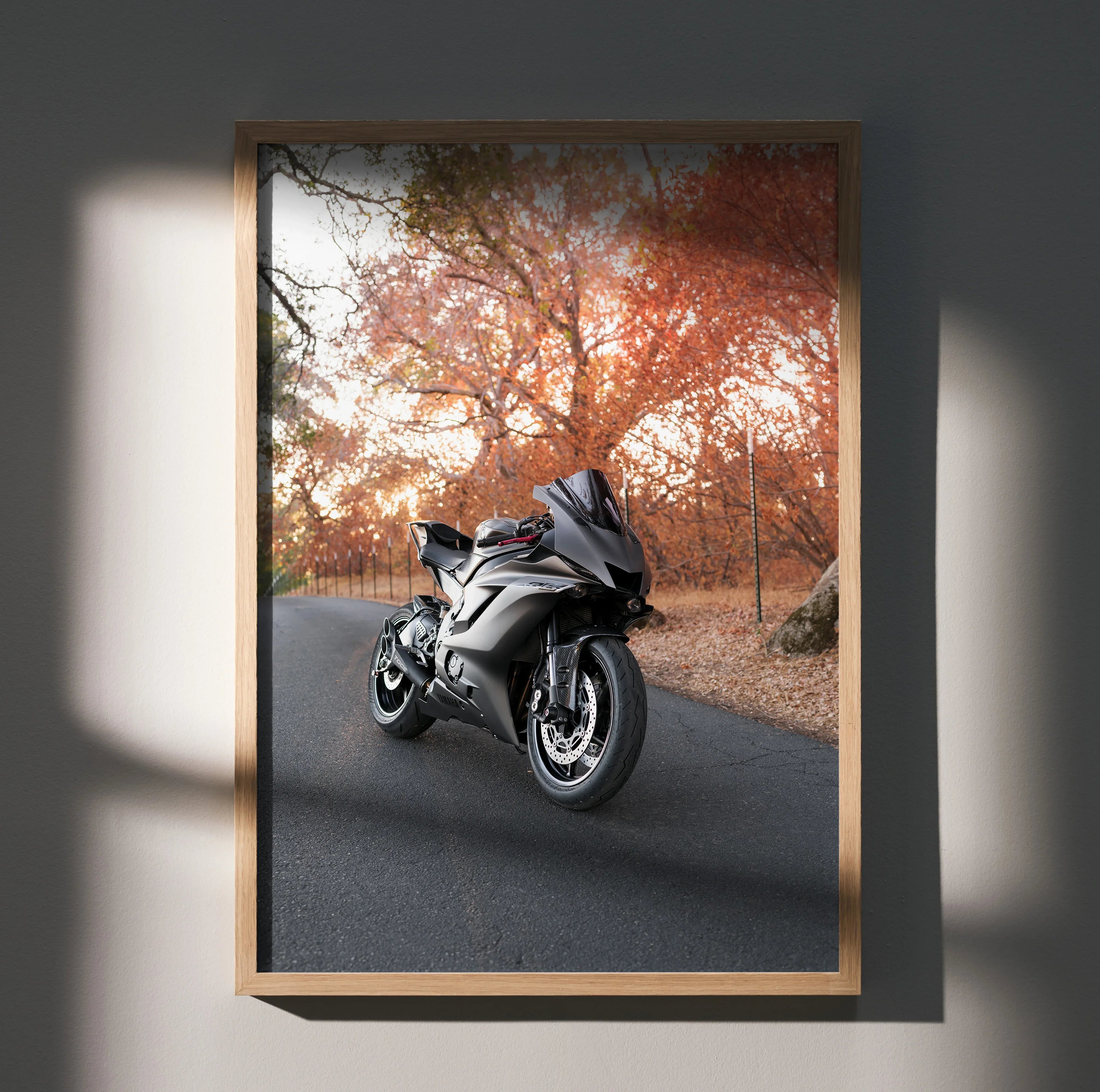 Yamaha R6 motorcycle on road with autumn trees background poster wall art in wooden frame.