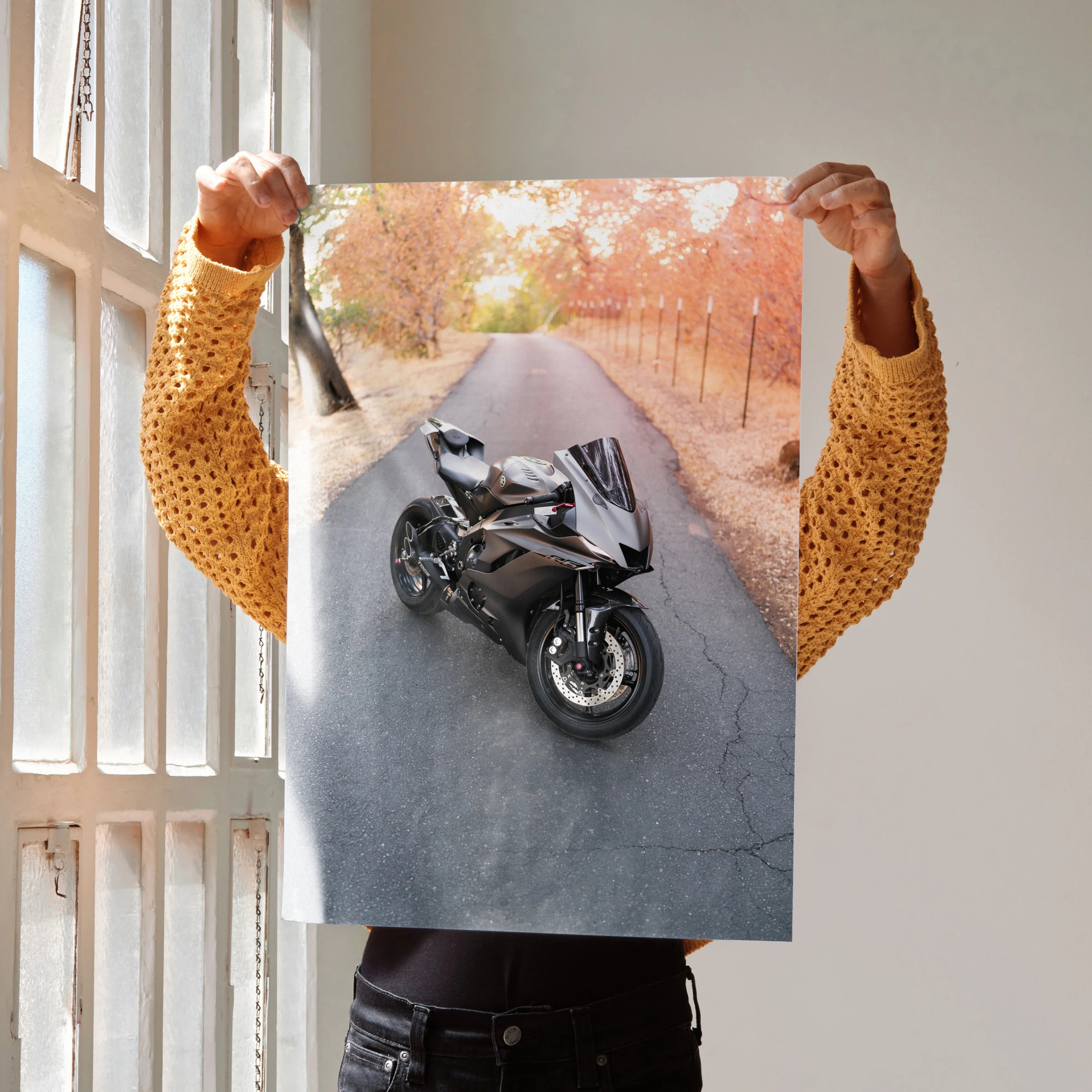 Yamaha R6 motorcycle on autumn road poster wall art with orange foliage background.
