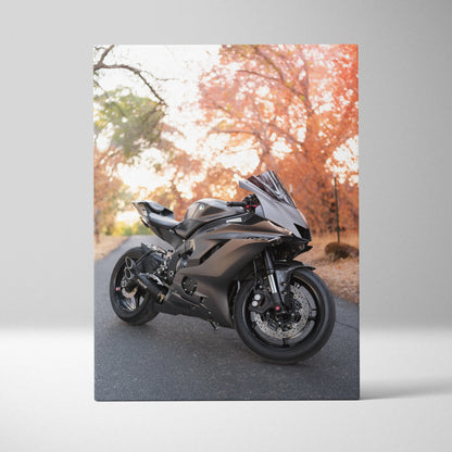 Yamaha R6 black sport motorcycle on road autumn trees canvas wall art vertical.
