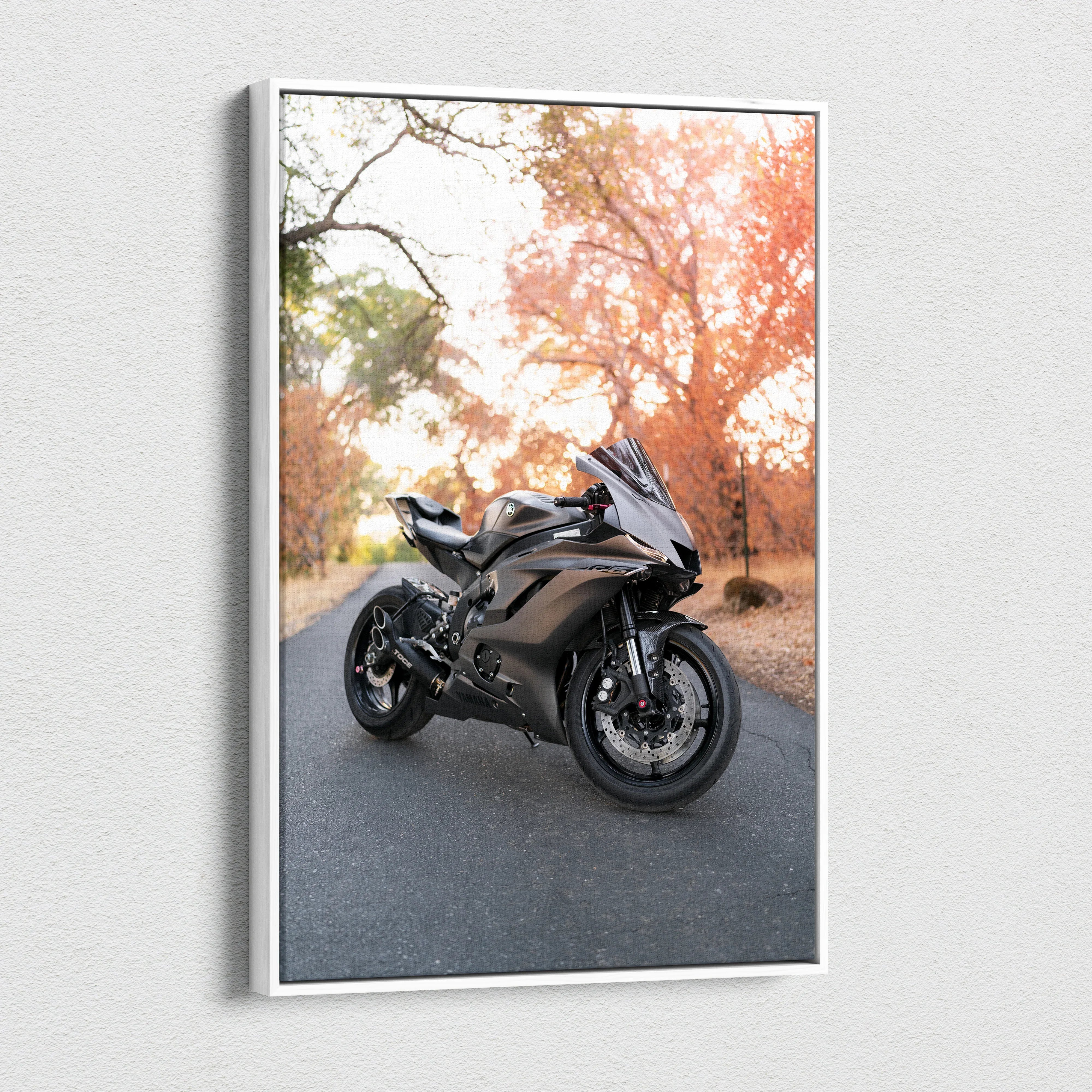 Yamaha R6 motorcycle on road with autumn trees canvas wall art vertical print.