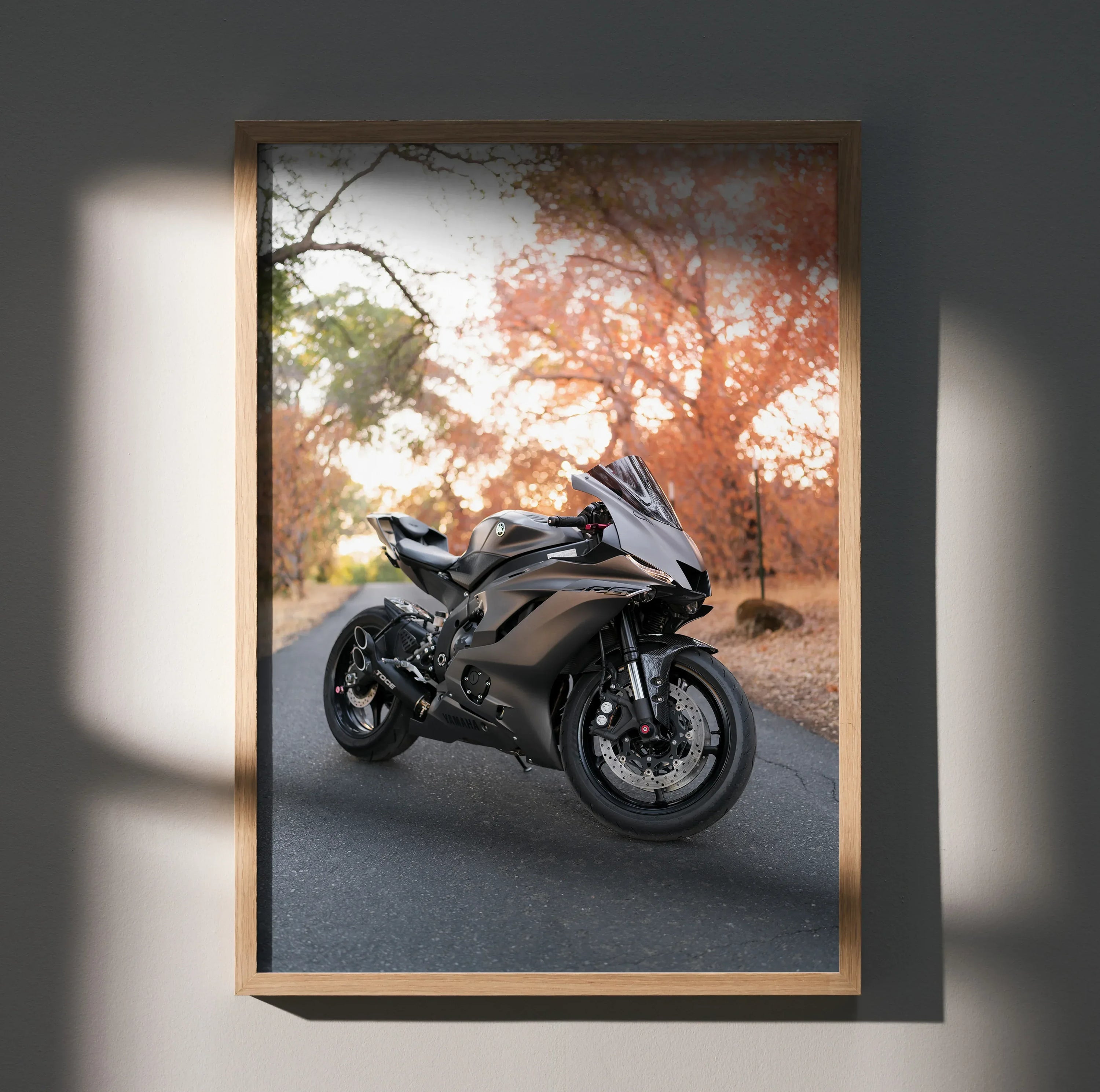 Yamaha R6 motorcycle sleek black design poster wall art with autumn trees background.