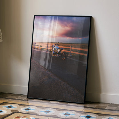 BMW R Nine T motorcycle against a dramatic sunset sky poster wall art with premium satin finish.
