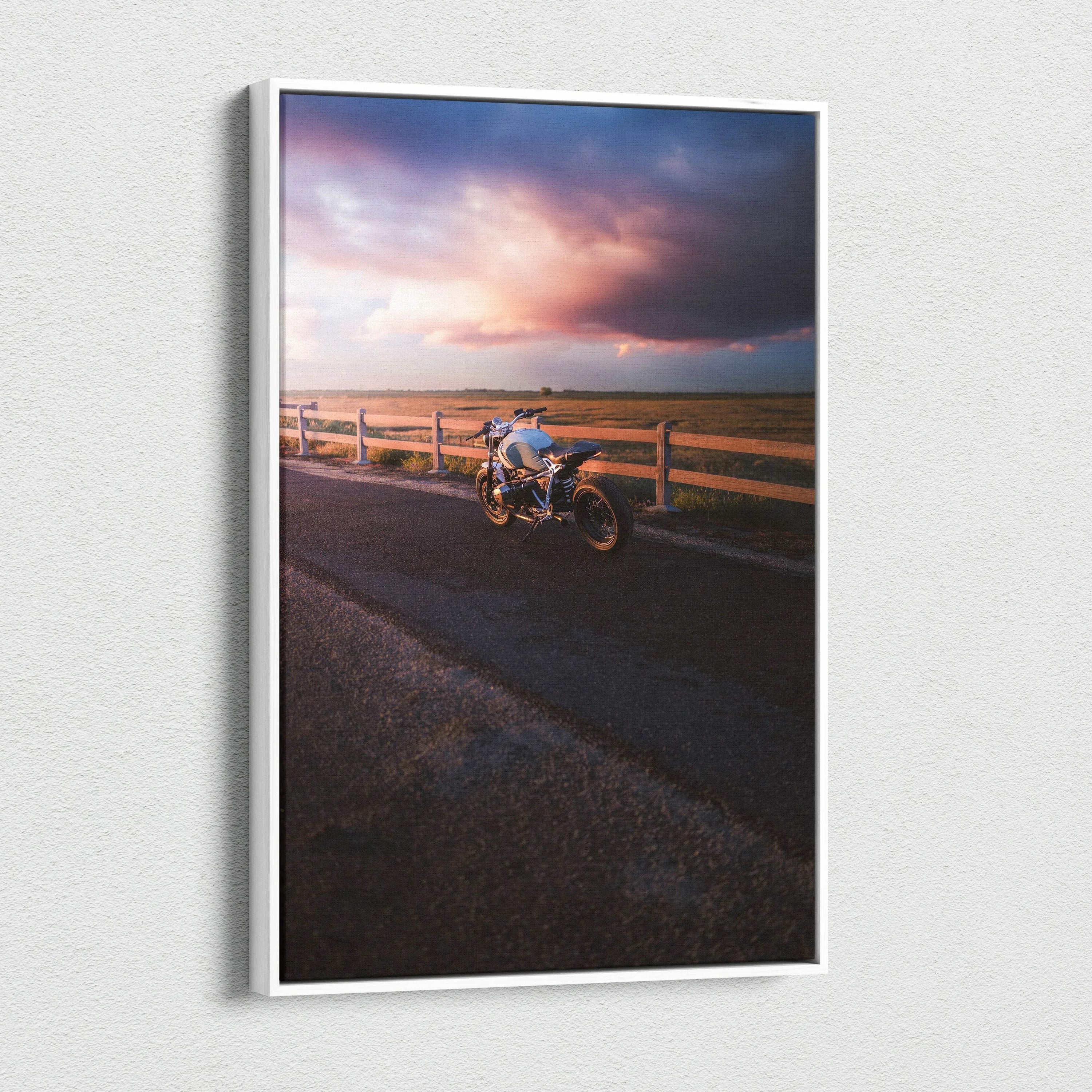 Vertical canvas wall art featuring a BMW R Nine T motorcycle with dramatic sunset sky background.