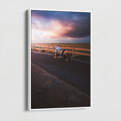 Vertical canvas wall art featuring a BMW R Nine T motorcycle with dramatic sunset sky background.