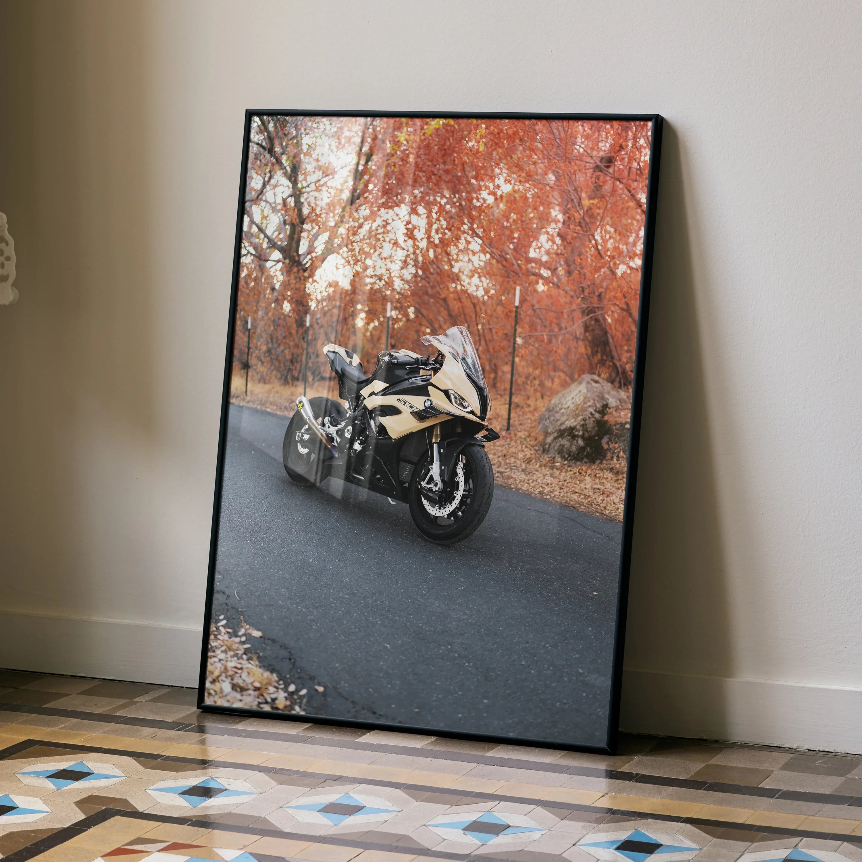 BMW S1000RR motorcycle poster with autumn forest background, modern wall art in black frame.
