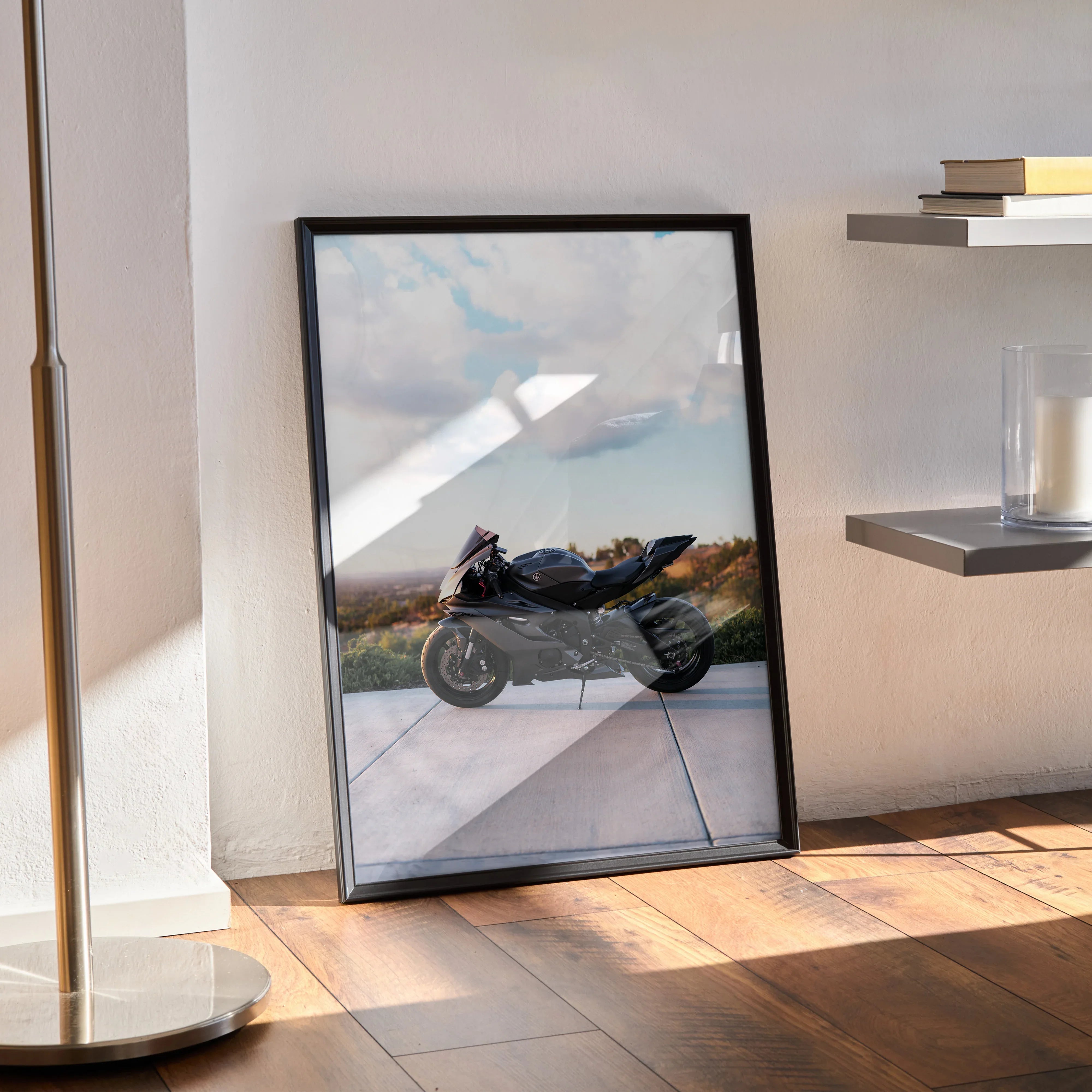Yamaha R6 motorcycle poster with sleek black frame, leaning against wall in sunlit room, modern wall art.