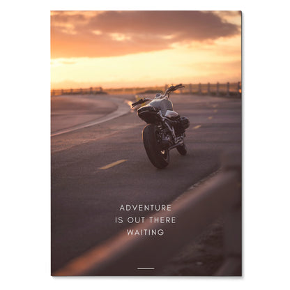 BMW R Nine T motorcycle on open road at sunset with "Adventure is out there waiting" poster wall art.