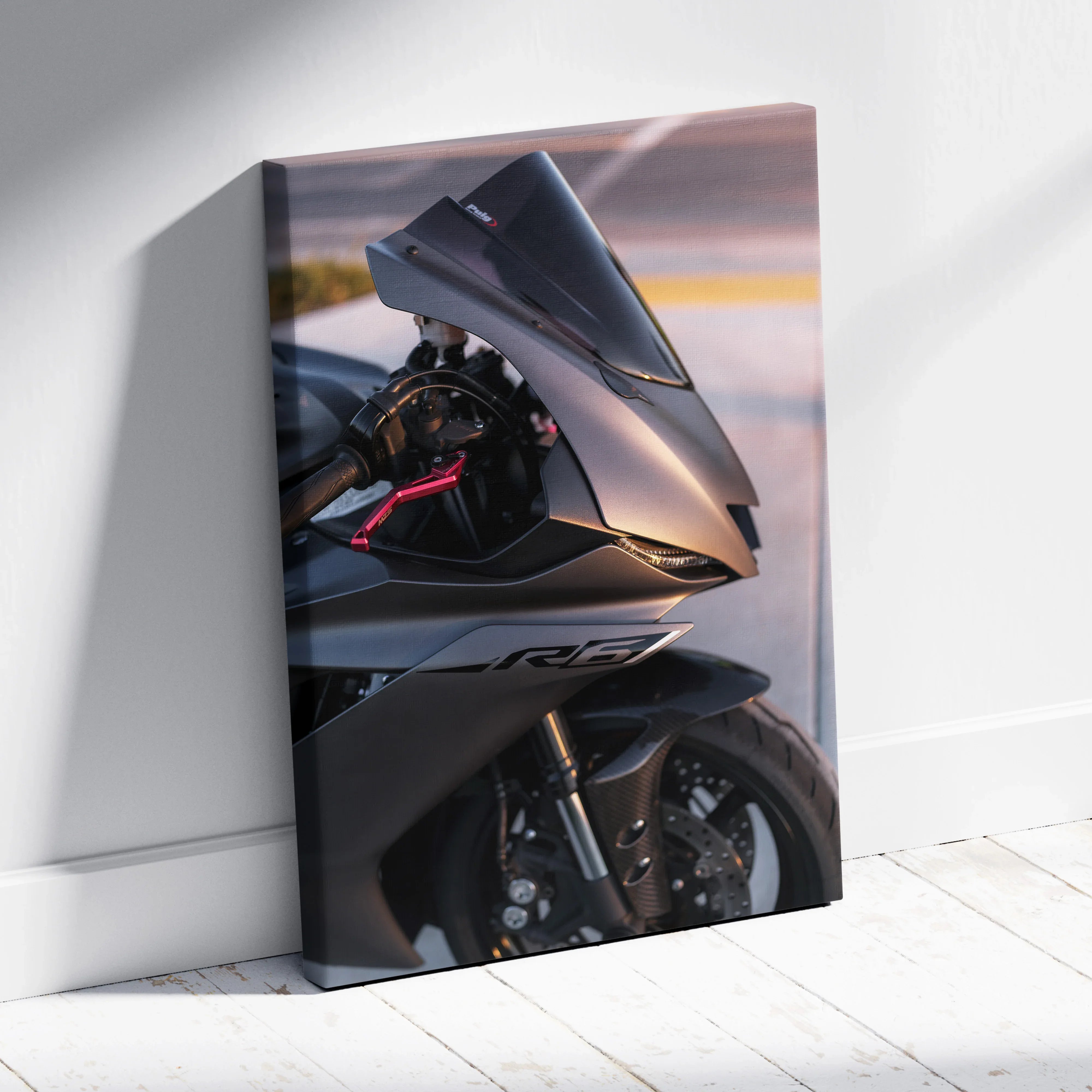 Yamaha R6 motorcycle close-up canvas art showing sleek black front fairing and wheel, vertical wall art canvas.