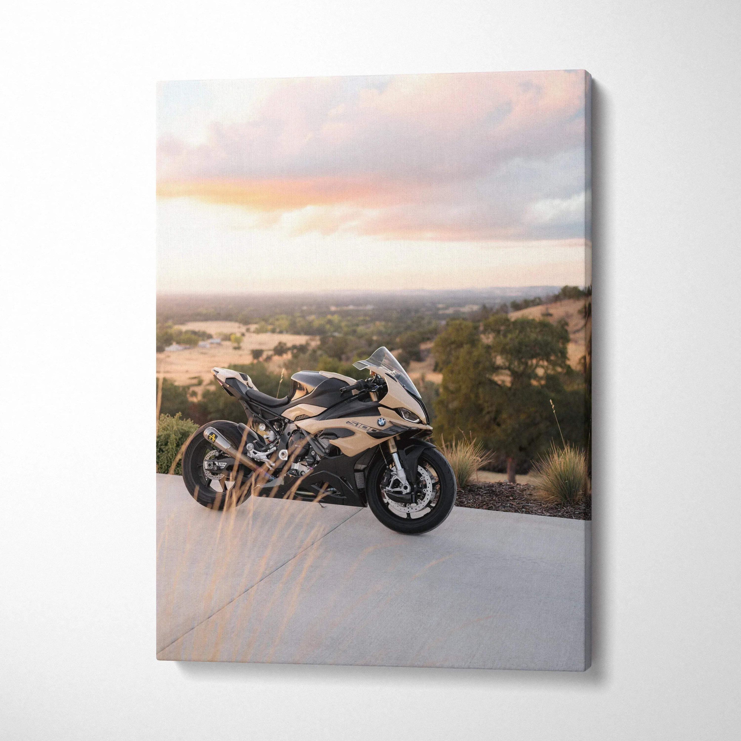Vertical canvas wall art featuring a BMW S1000RR motorcycle against a sunset landscape background.