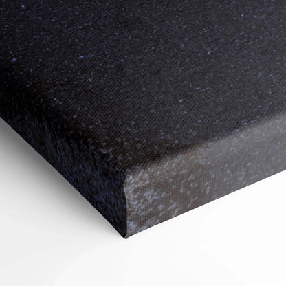 Close-up of textured black canvas corner showcasing premium museum-quality wall art finish.