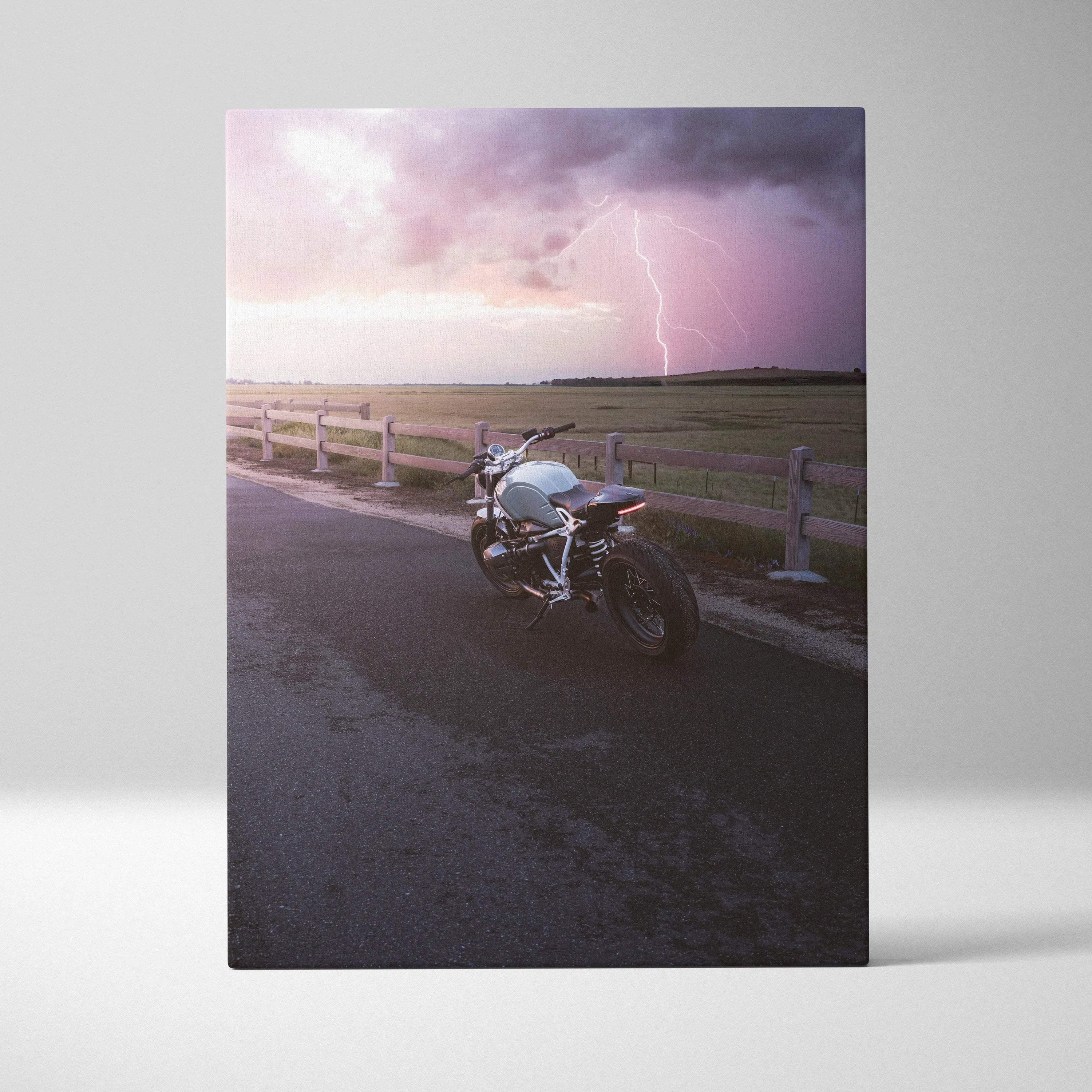 BMW R Nine T motorcycle on road with stormy sky and lightning, vertical canvas wall art.