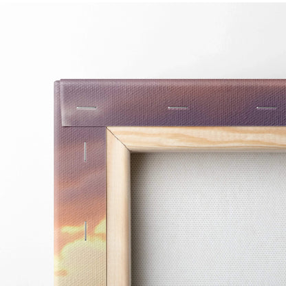 Close-up of wooden frame and stretched canvas corner with sunset tones on wall art canvas print.