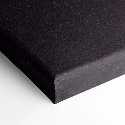 Black stretched canvas corner with textured fabric, high-quality wall art material.