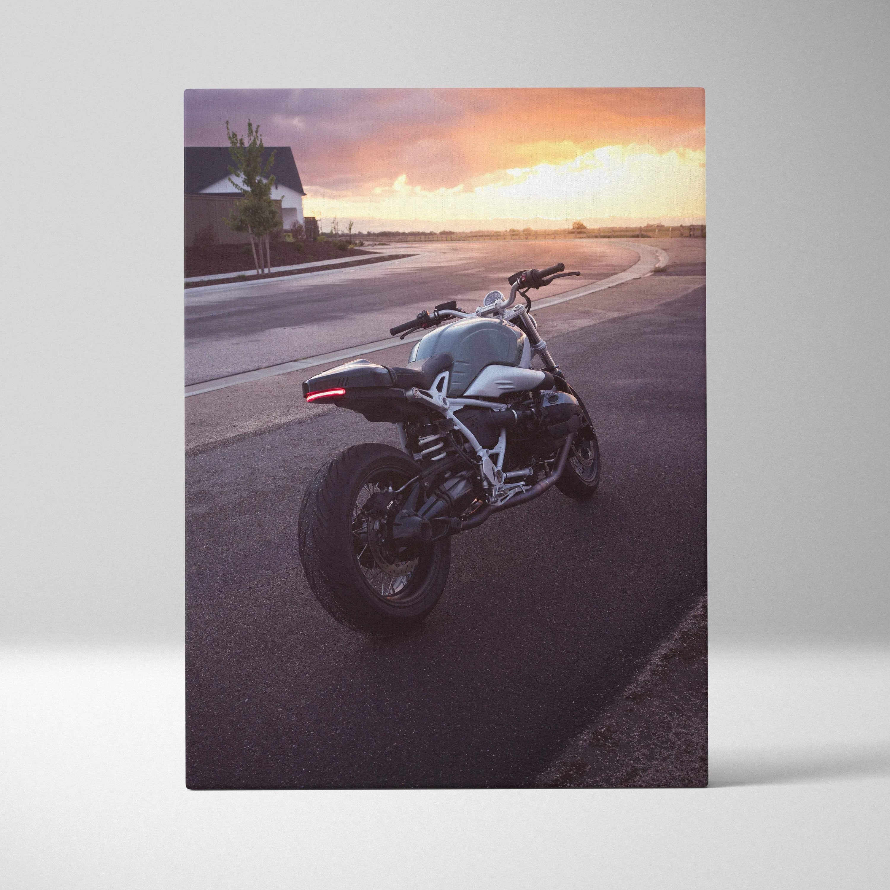 BMW R Nine T motorcycle canvas wall art with sunset background and urban road scene.